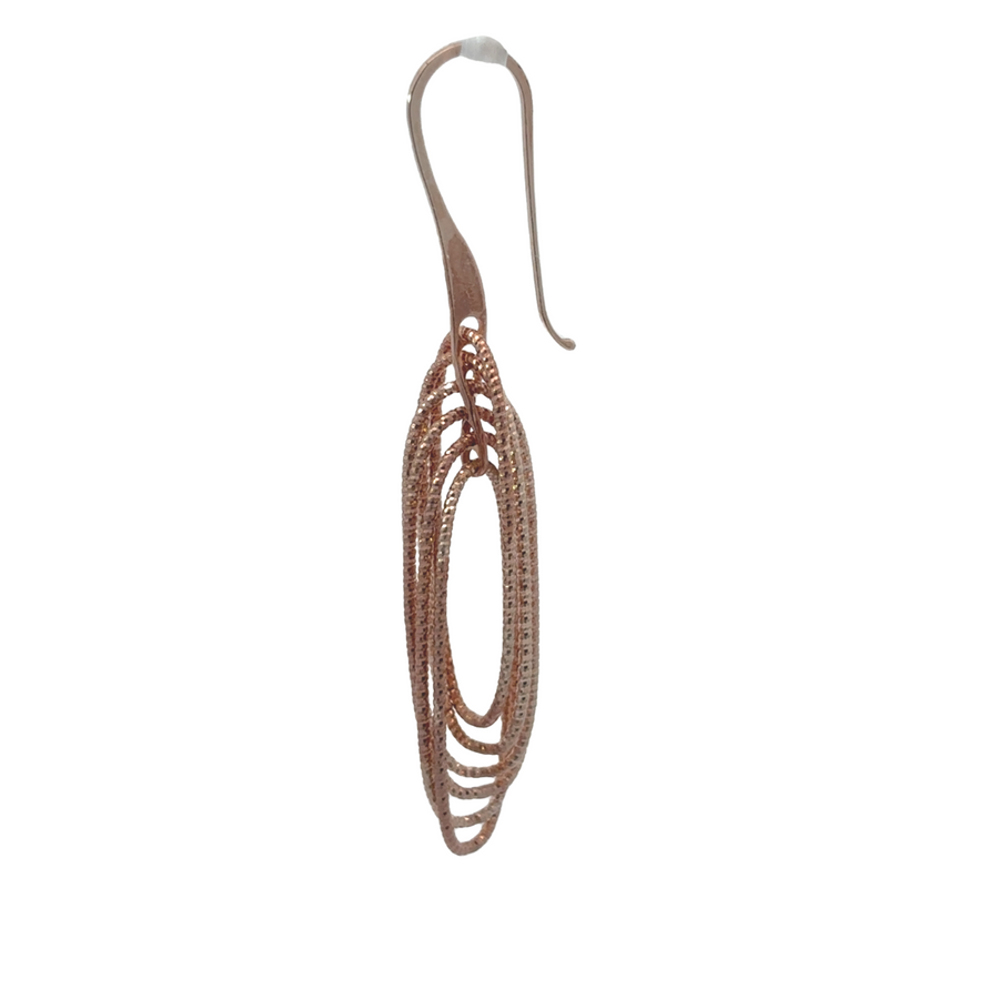 Elegant oval-shaped silver earrings with diamond-cut finish