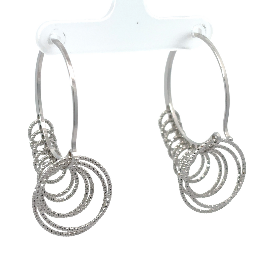 Classic silver circle earrings on white background