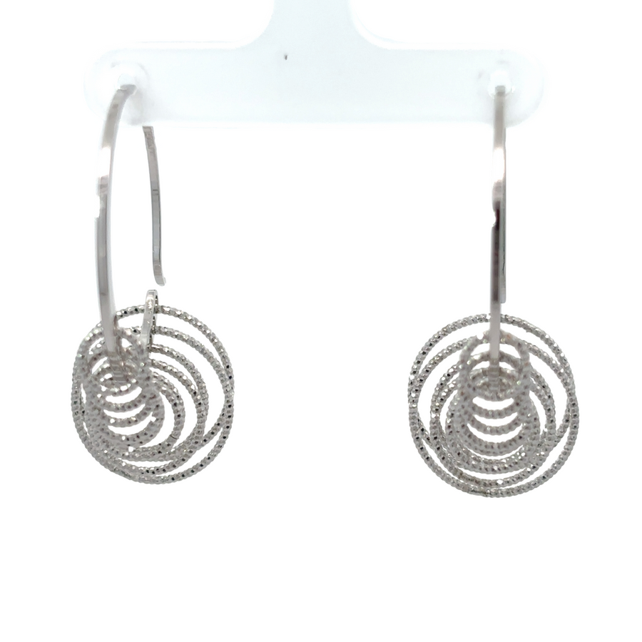 Elegant silver earrings with diamond cut design