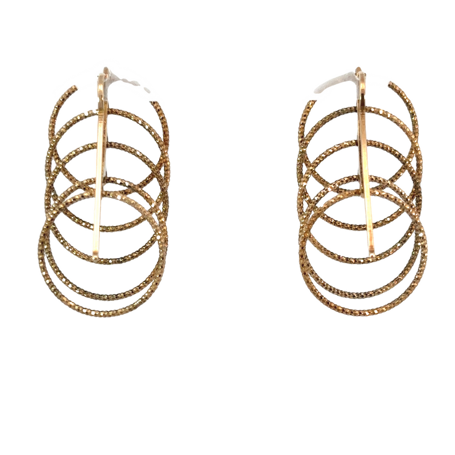 Lightweight diamond cut silver earrings displayed on white background
