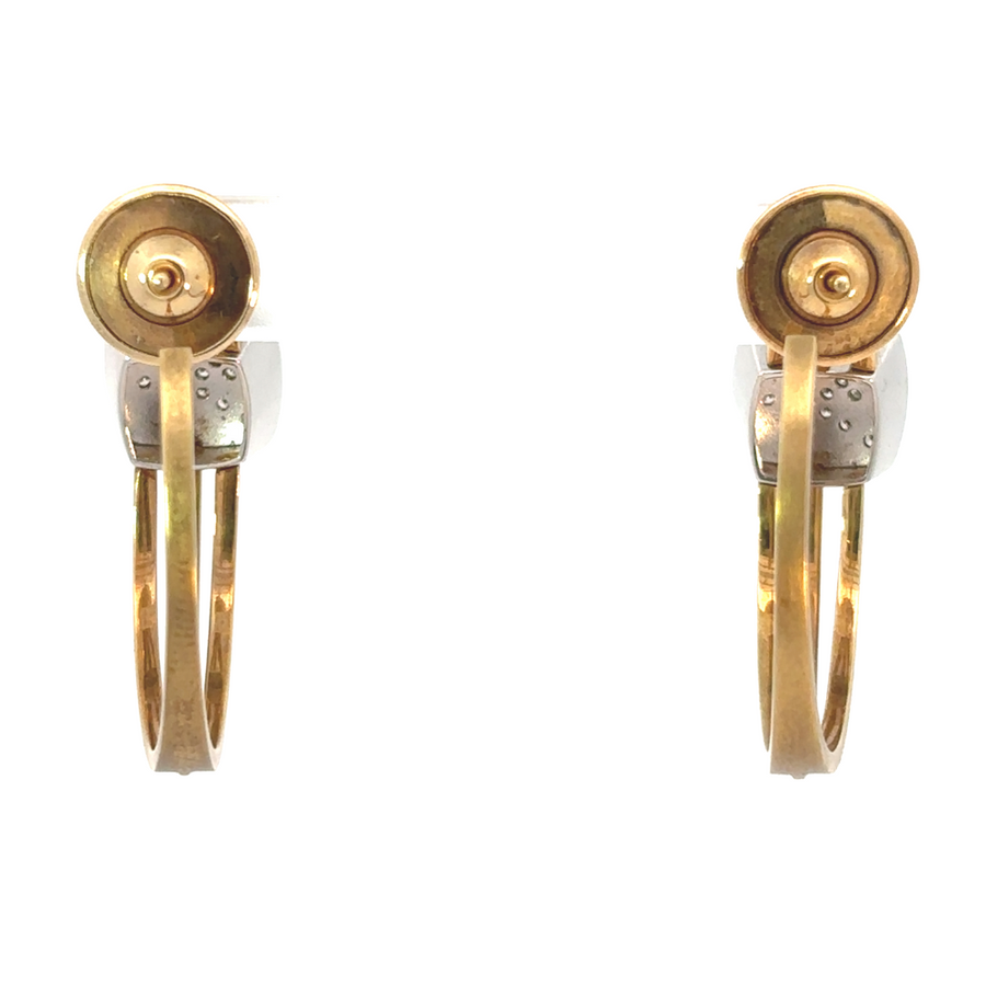 Side view showing yellow and white gold contrast on earrings
