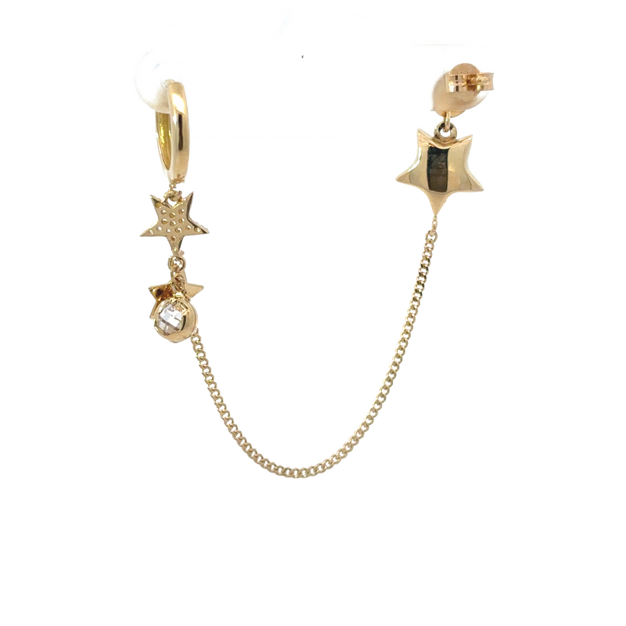 Close-up of the star design on the 14k gold earrings, showcasing the shine and sparkle