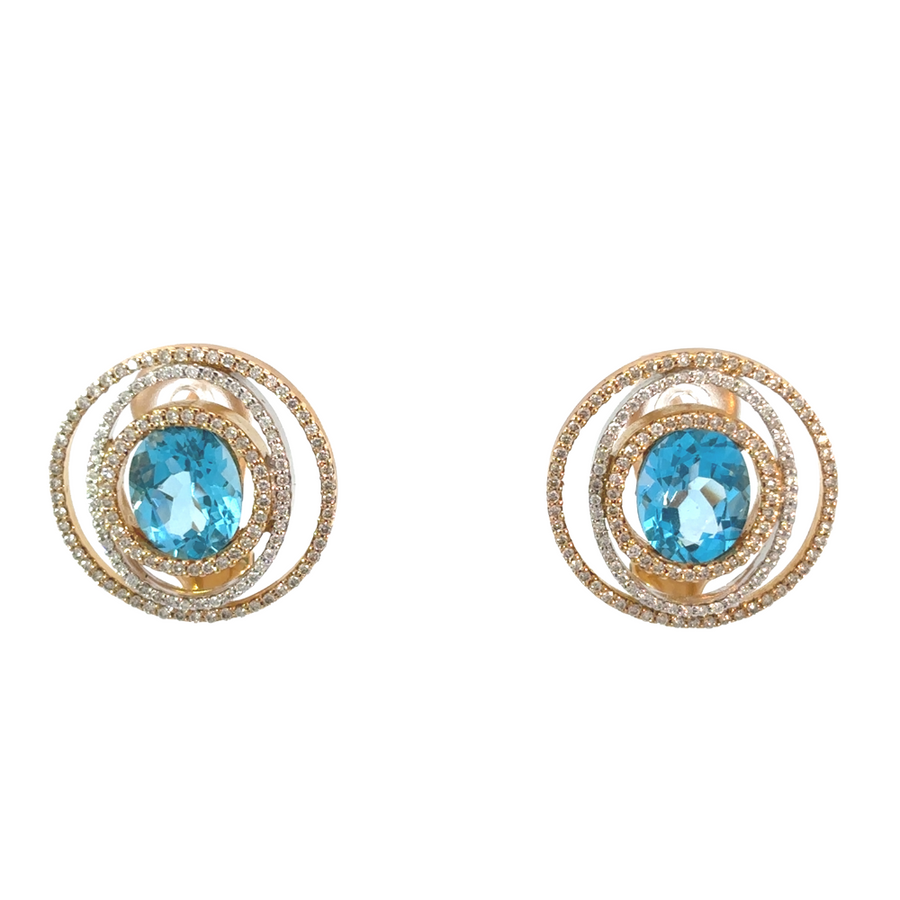 Close-up of 14k gold earrings with sparkling diamonds