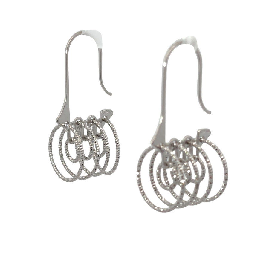 Elegant silver earrings featuring layered small circles