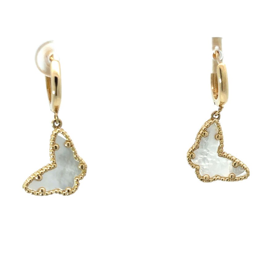 Woman wearing full 14k gold jewelry set with evening dress