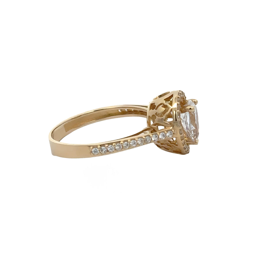Side profile of 14k gold solitaire ring showcasing gemstone