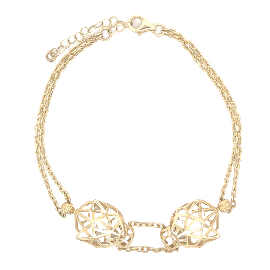 Close-up of the 14k gold bracelet with adjustable clasp, showcasing its elegant design and shine
