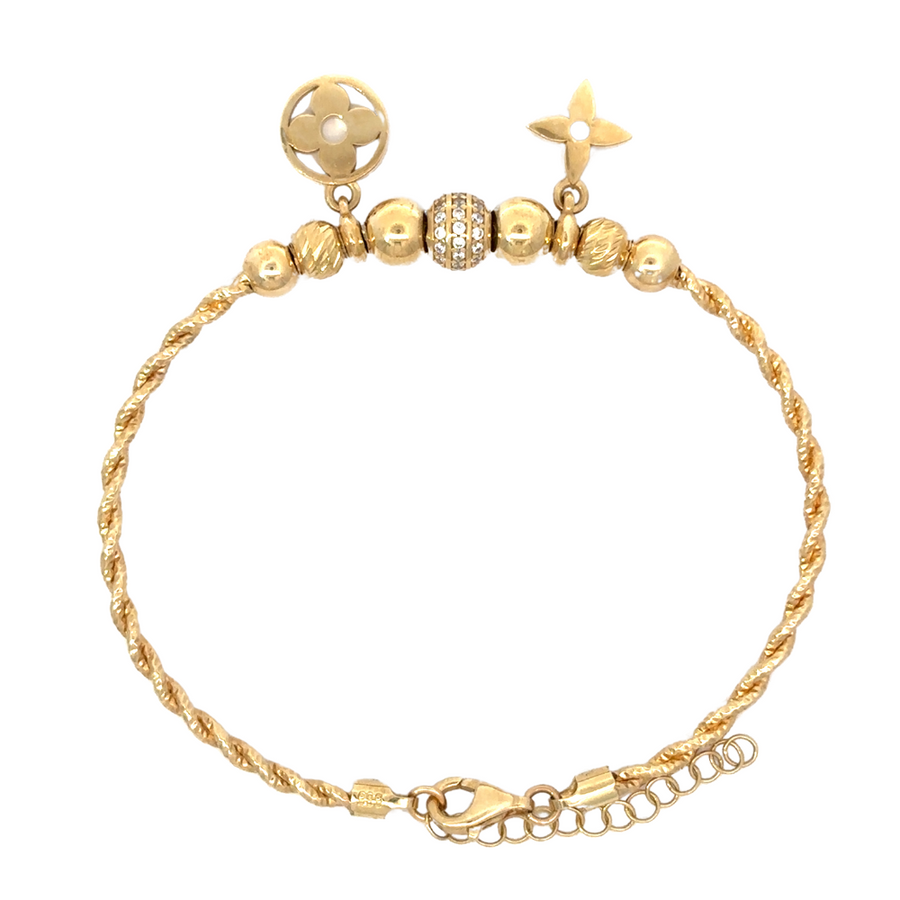 Close-up image of the 14k gold bracelet, showcasing its minimalist and elegant design