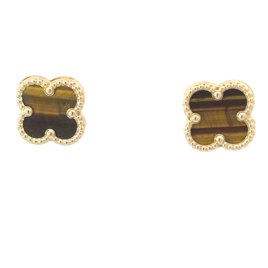 Pair of 14k gold earrings on white background