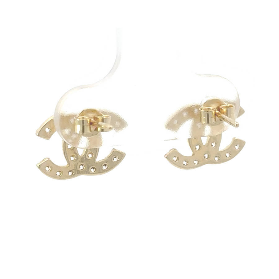 Detail view of earrings showing CZ sparkle in natural light