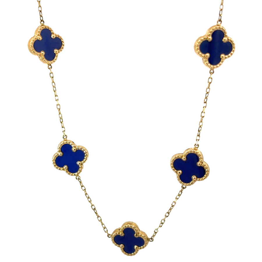 Close-up of the 14k gold necklace with nine blue stones, showing the intricate setting and vibrant color.