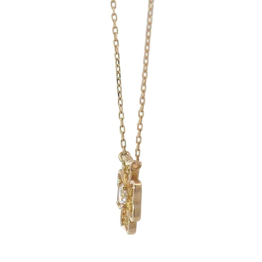 14k gold necklace with center flower motif, featuring delicate CZ accents for a feminine touch.