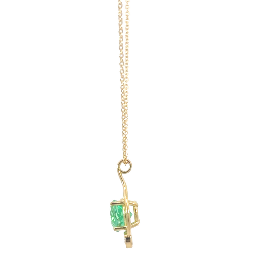 Elegant emerald pendant on 18k gold necklace