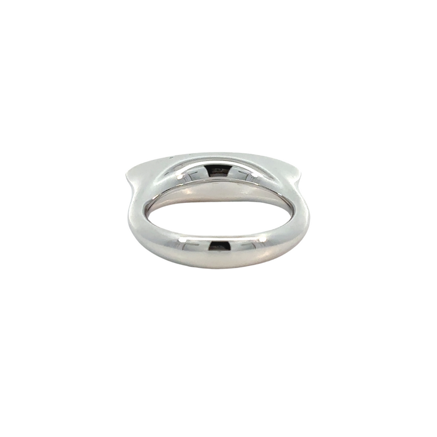 Stunning green CZ silver ring displayed on white background