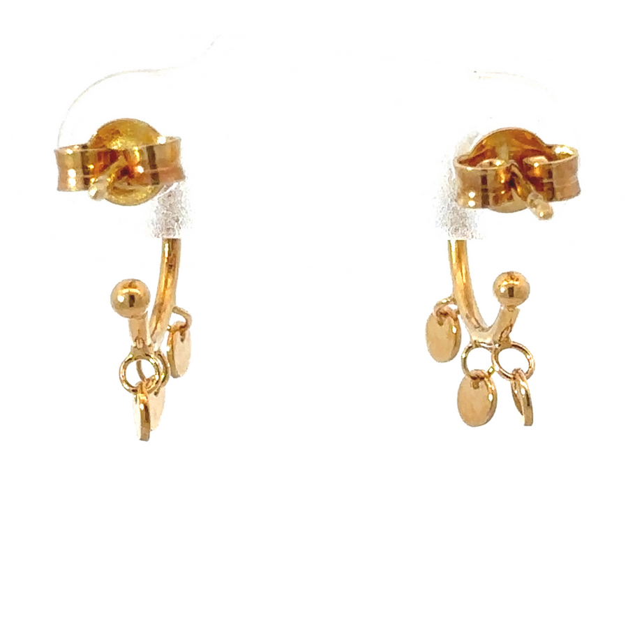 Close-up of 14k gold hoops showing hanging circle detail