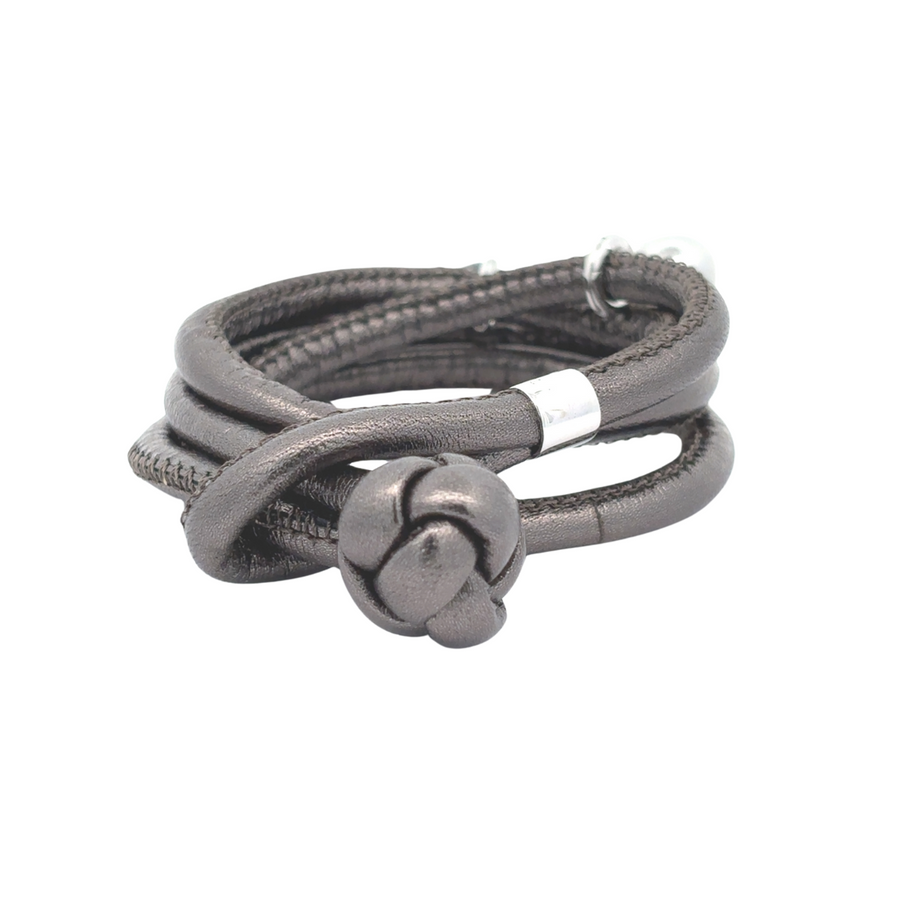 39 cm leather bracelet with gold highlights coiled flat