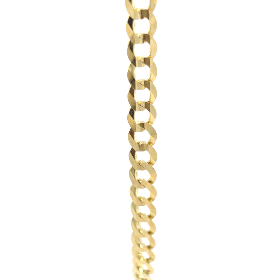 Man wearing 20-inch Cuban link chain with a black T-shirt