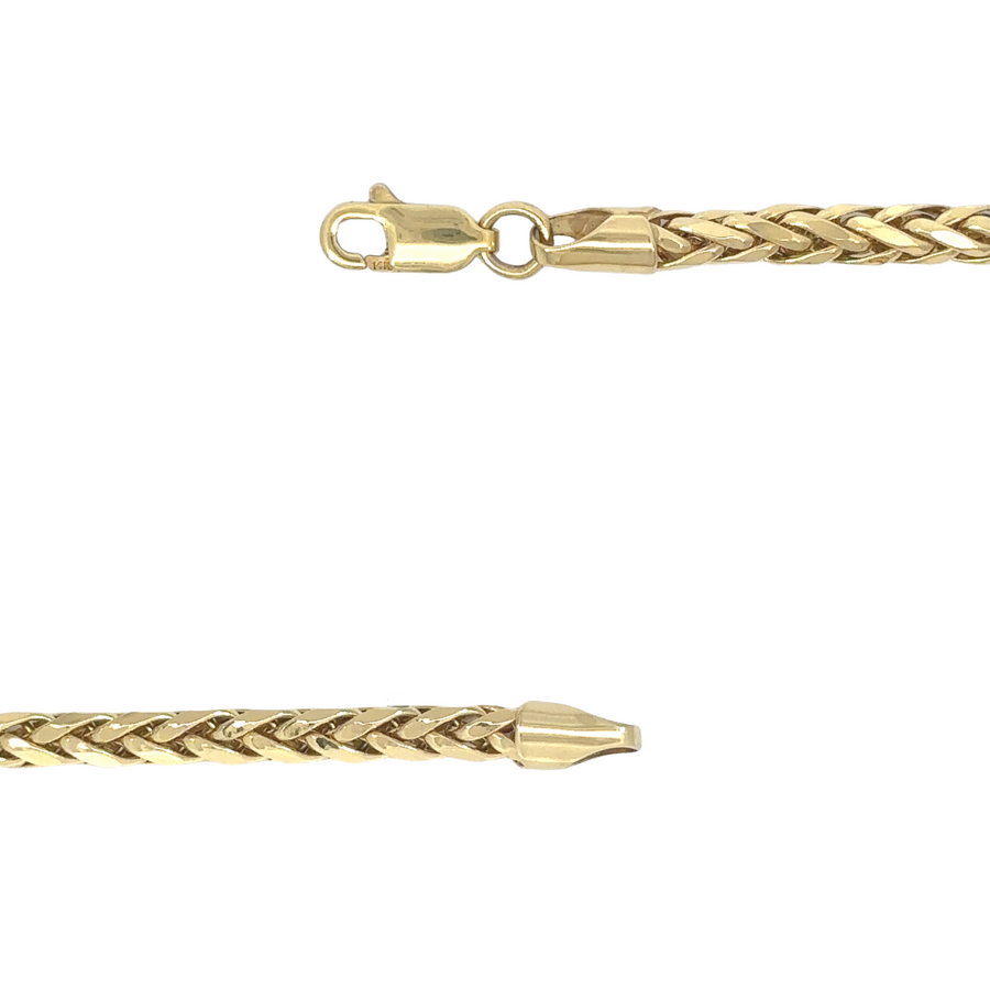 Model wearing 14k gold snake chain 24.25 inches for men