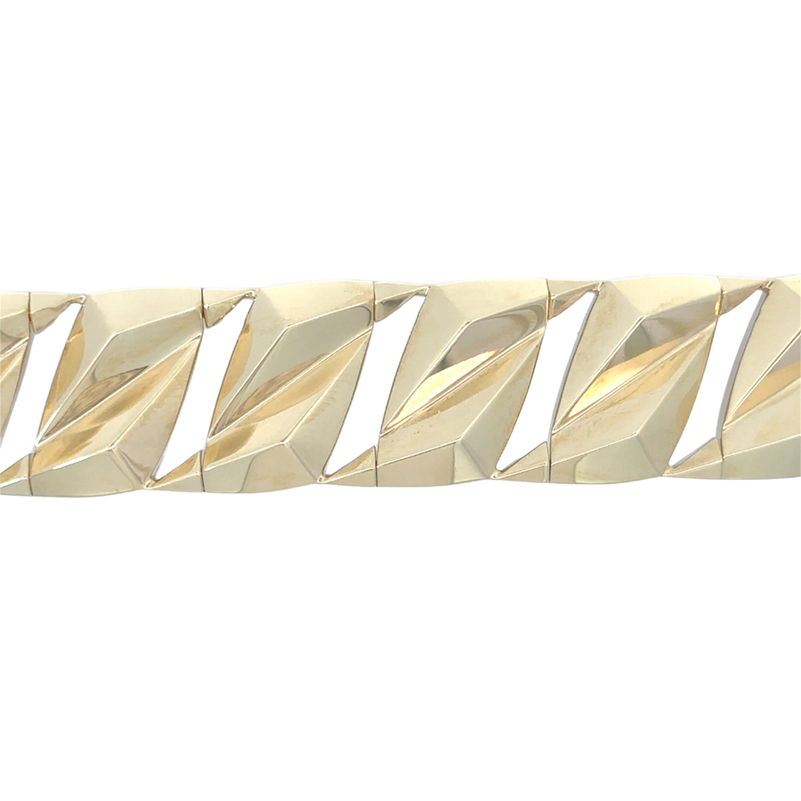 Men’s 14k gold bracelet with a wide design, a statement piece for any occasion