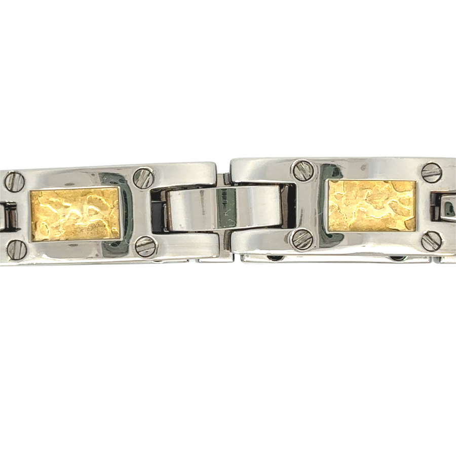 Side view of bracelet showing the contrast between titanium and gold accents