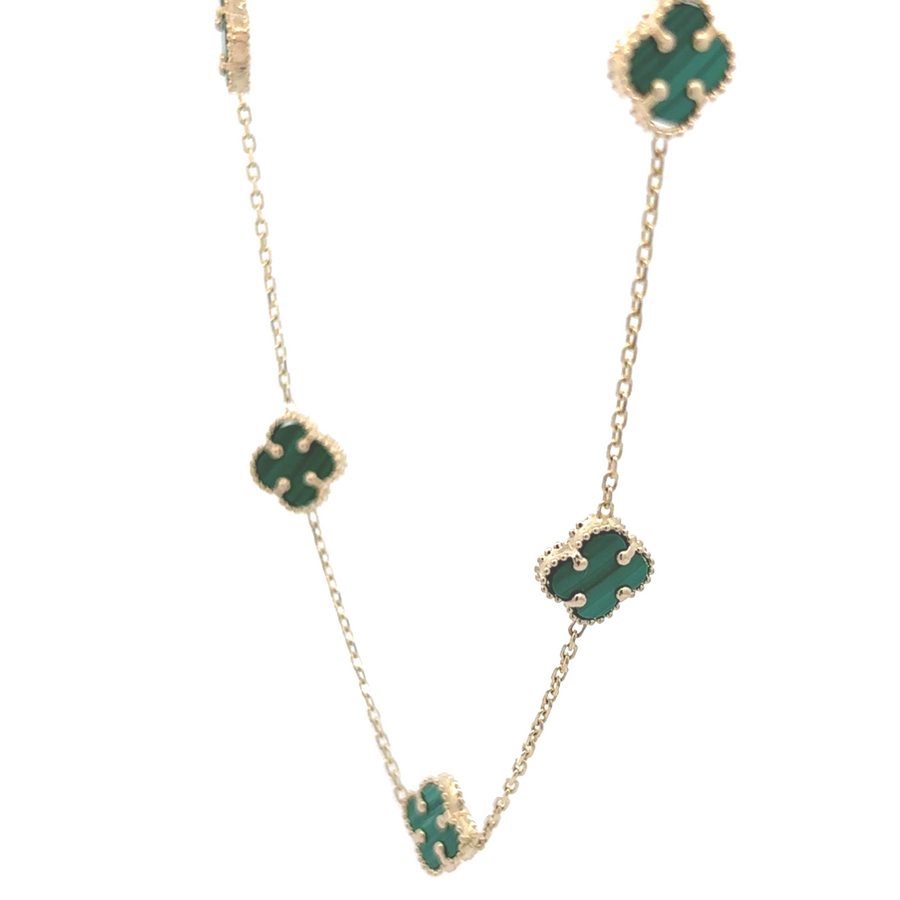 Side view of the 14k gold necklace, showcasing the adjustable length and smooth finish.