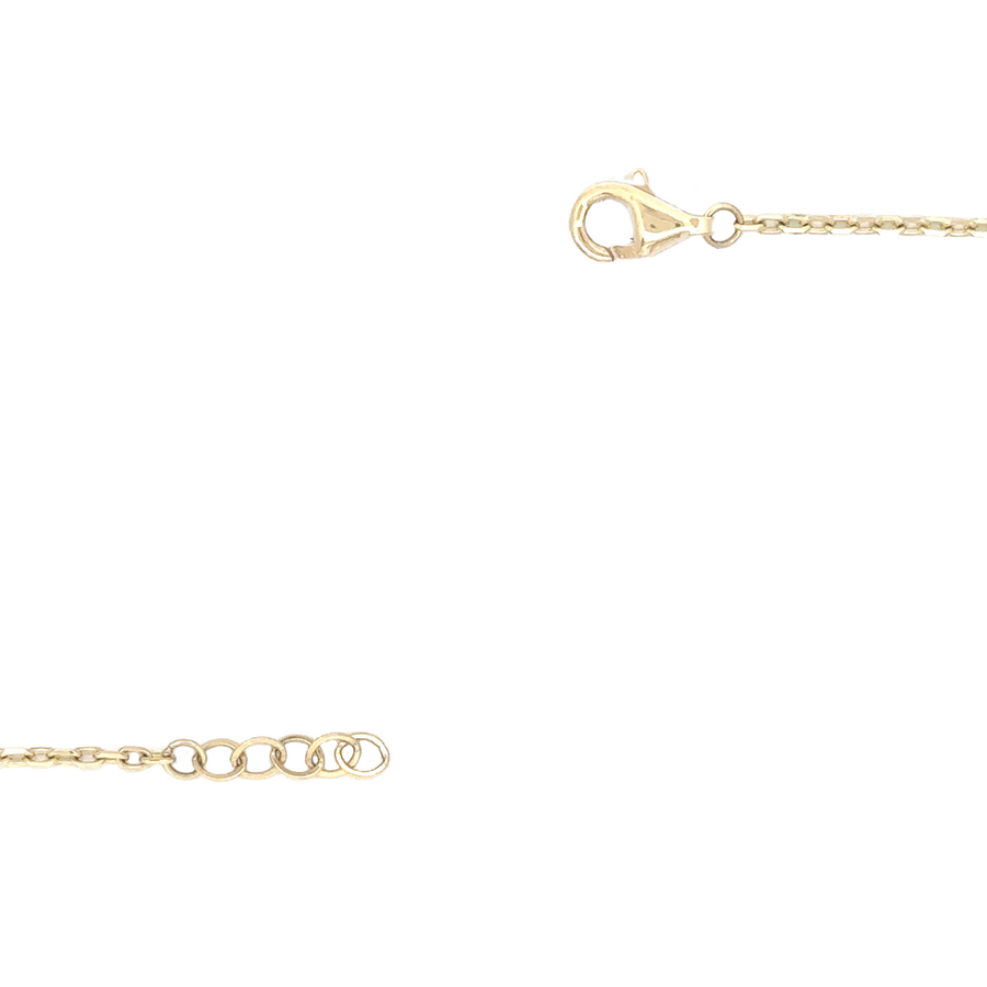 Close-up of the ten delicate green accents in the 14k gold necklace, emphasizing the fine detail.
