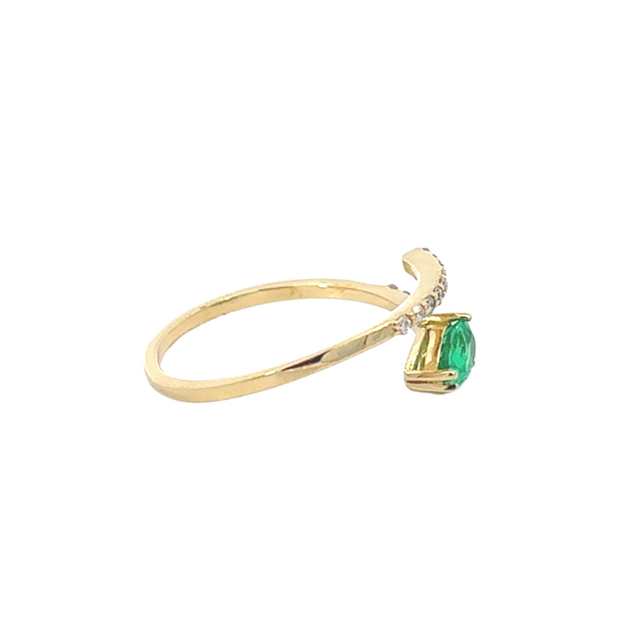 Unique open-band gold ring featuring green gemstone