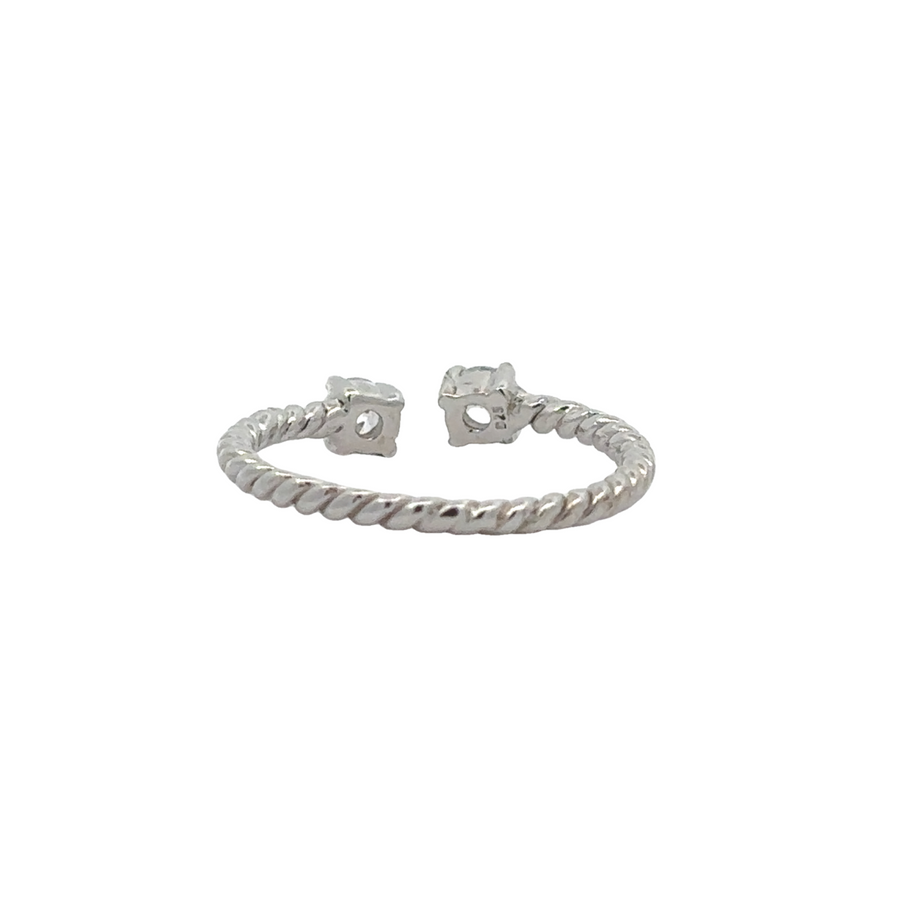 Dainty silver rope ring displayed flat on a white background