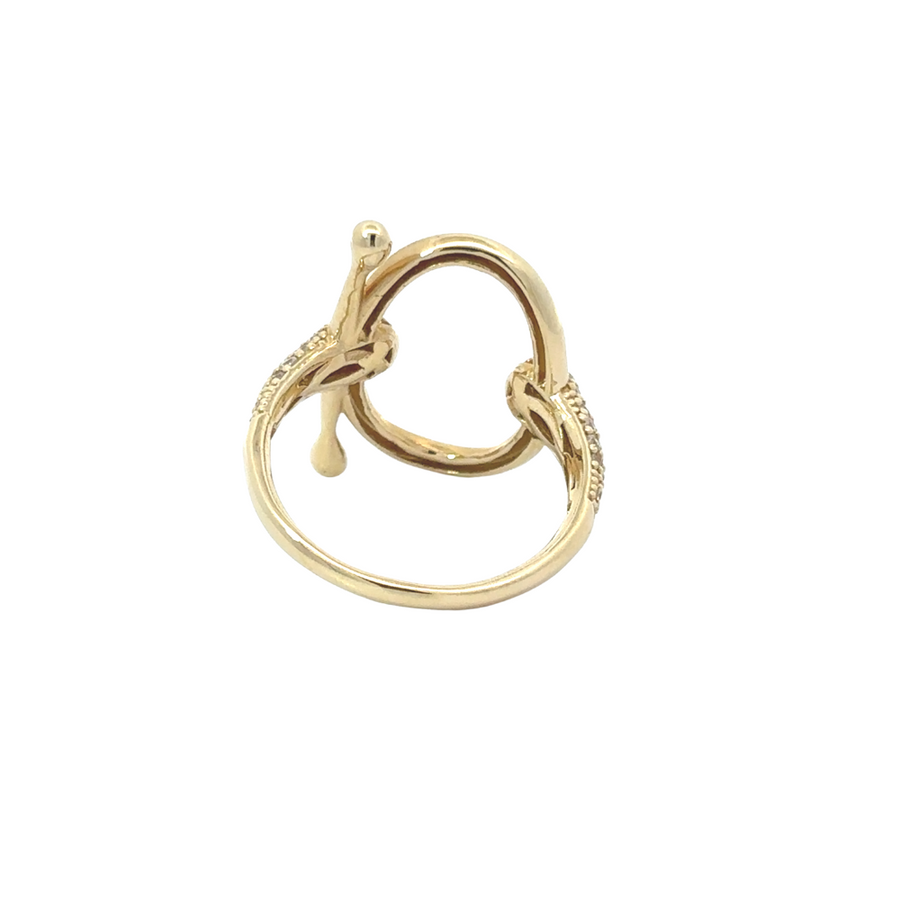 Close-up shot of the 14k gold ring with cubic zirconia stones, emphasizing its brilliance
