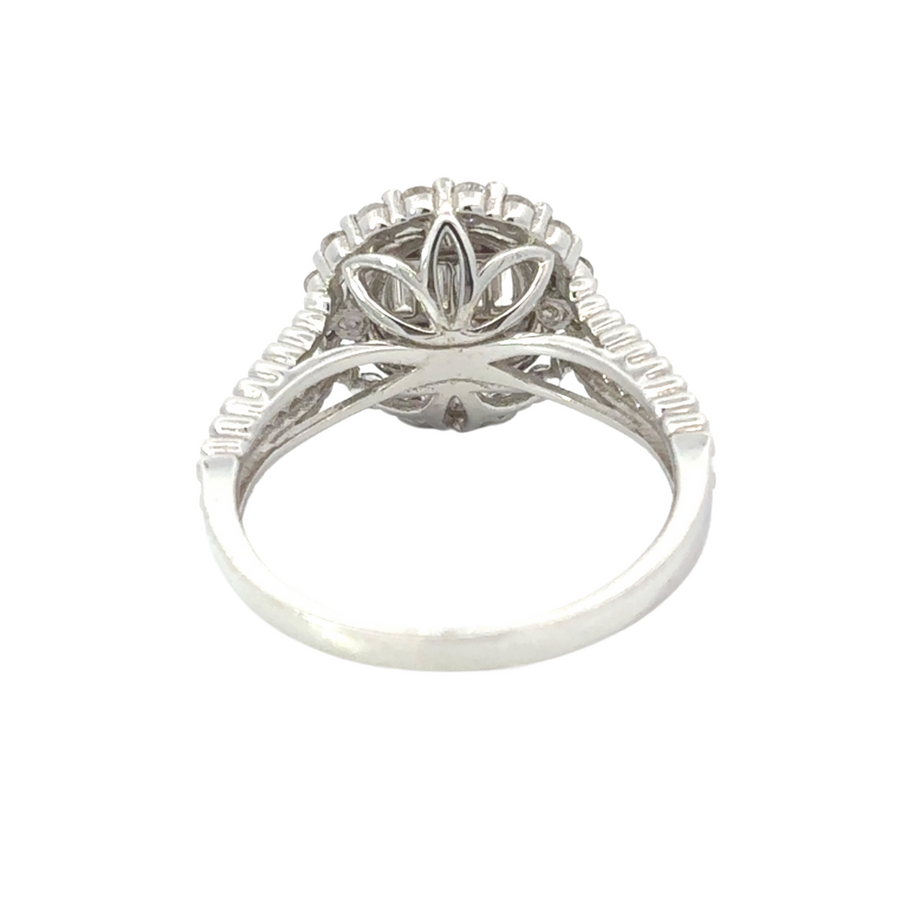 Close-up of diamond ring in polished 14k gold