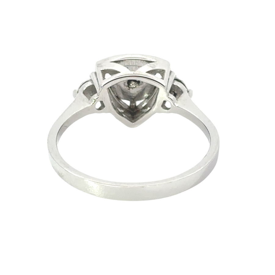 Woman wearing 14k gold ring with dazzling diamond accents