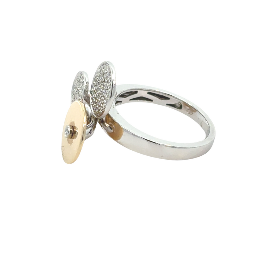 Matching gold earrings with diamonds in velvet jewelry box