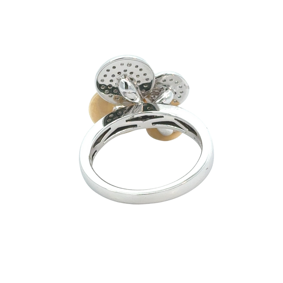 Model wearing the diamond earrings and ring set for formal event