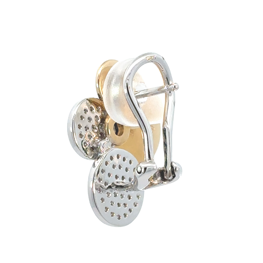 Earrings and ring set styled with other gold accessories