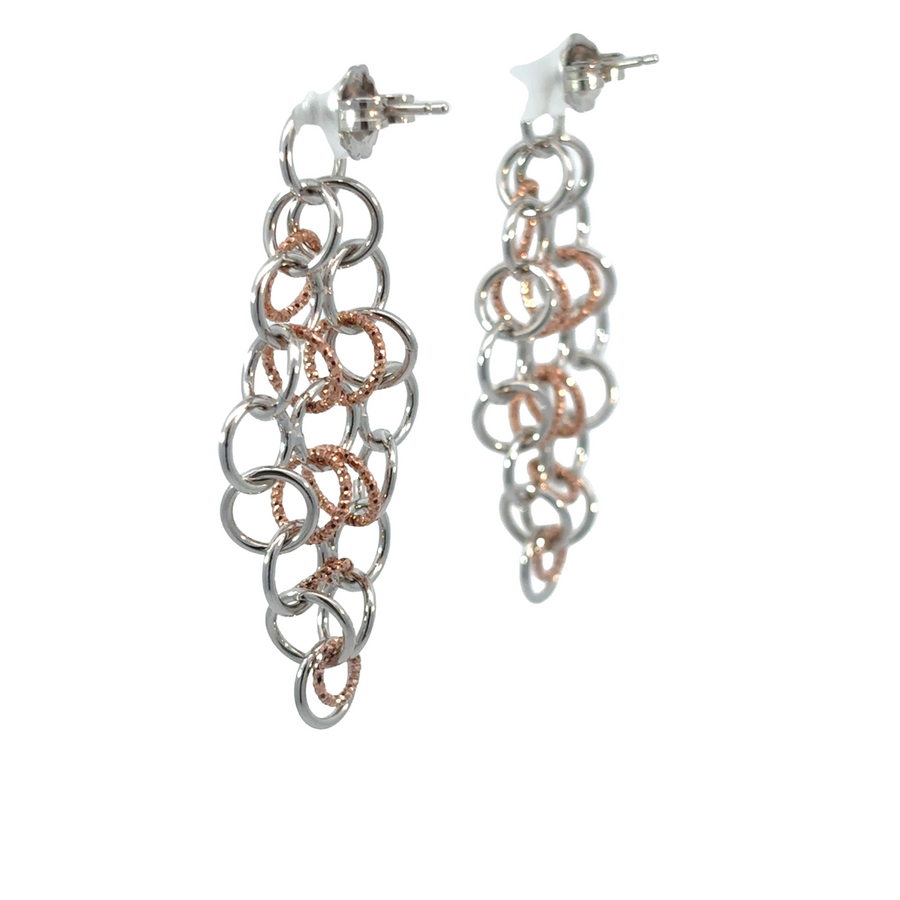 Minimalist silver earrings with XS circle pattern