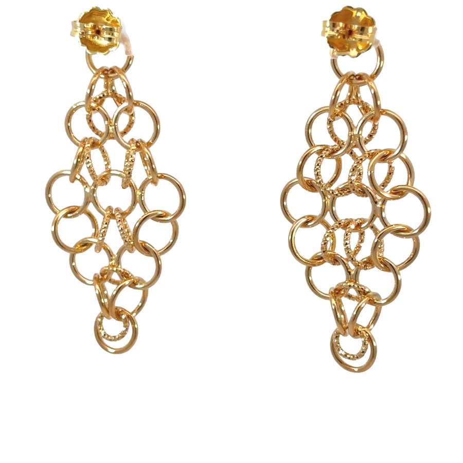 Minimalist silver earrings with repeating small circles