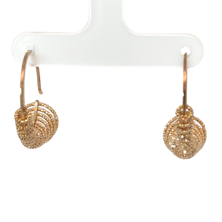 Silver earrings with modern S circle design

