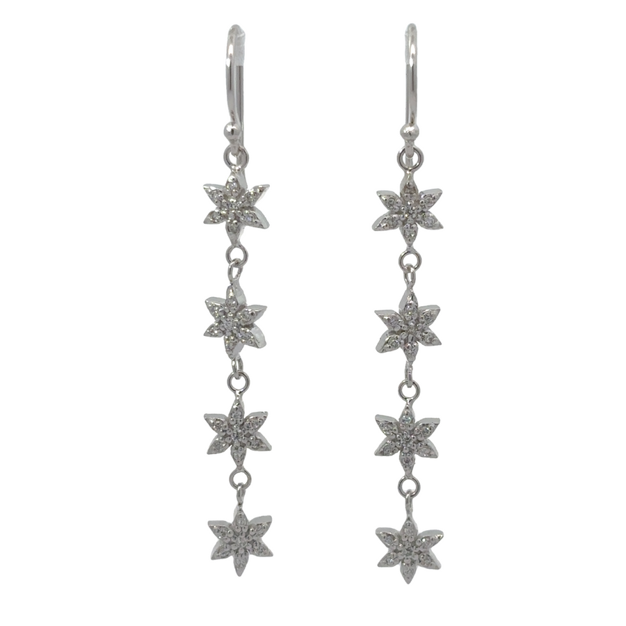 Silver earrings with small 4-flower design close-up