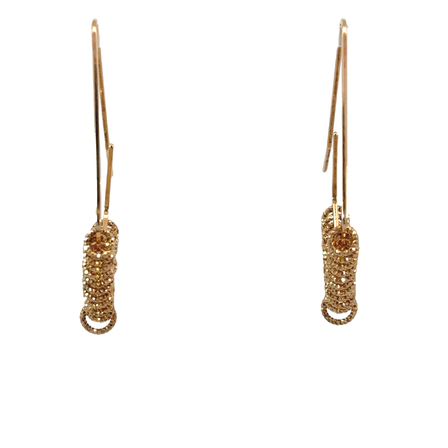 Silver earrings with small XS circles on white background