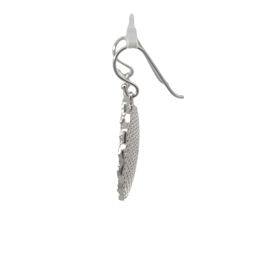 Woman wearing silver large circle earrings with casual outfit