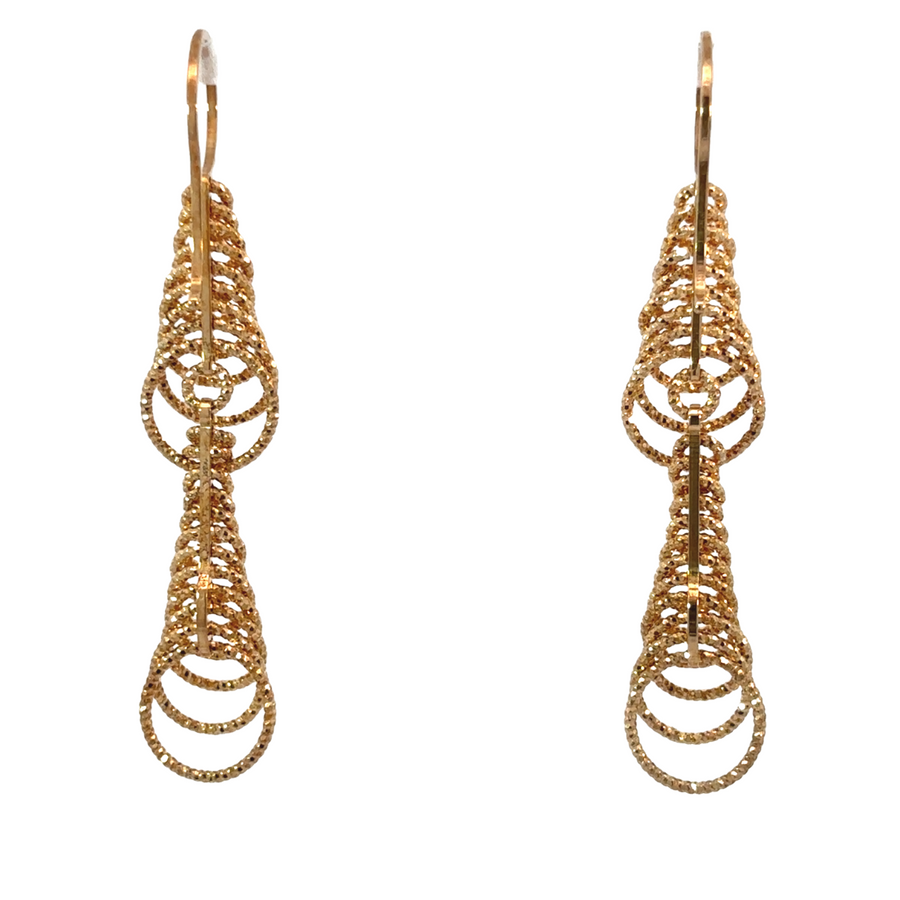 Elegant silver earrings with circle design displayed on white background