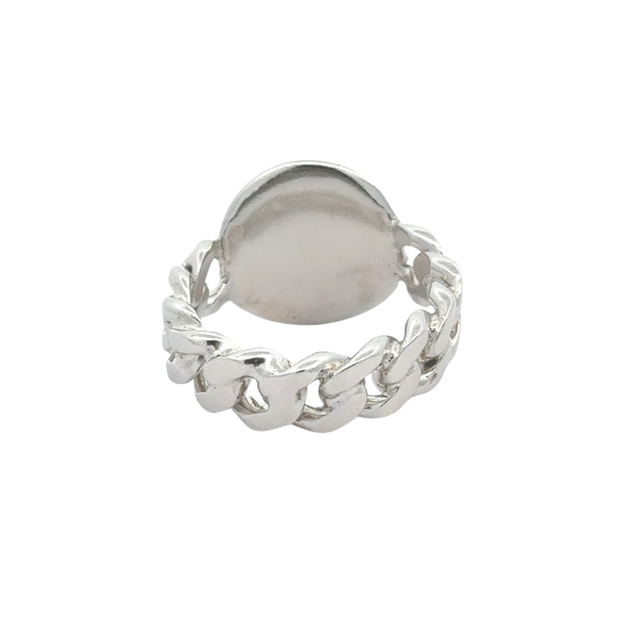 Side view of silver ring with polished finish and CZ stone
