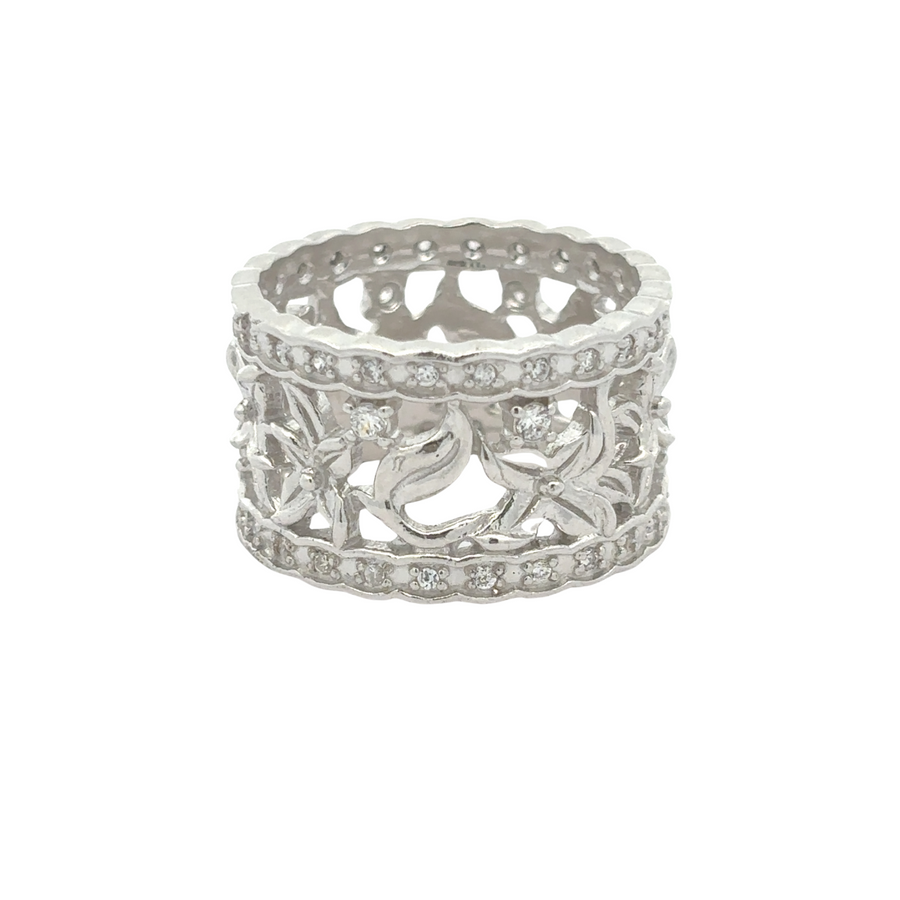 Delicate silver ring showcasing floral and leaf pattern