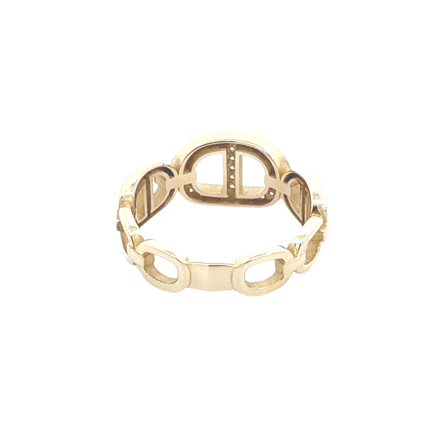 Close-up of sparkling CZ accents on slim gold band