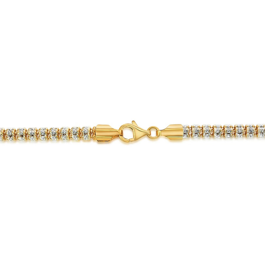 Shiny two-tone silver diamond-cut chain on white background