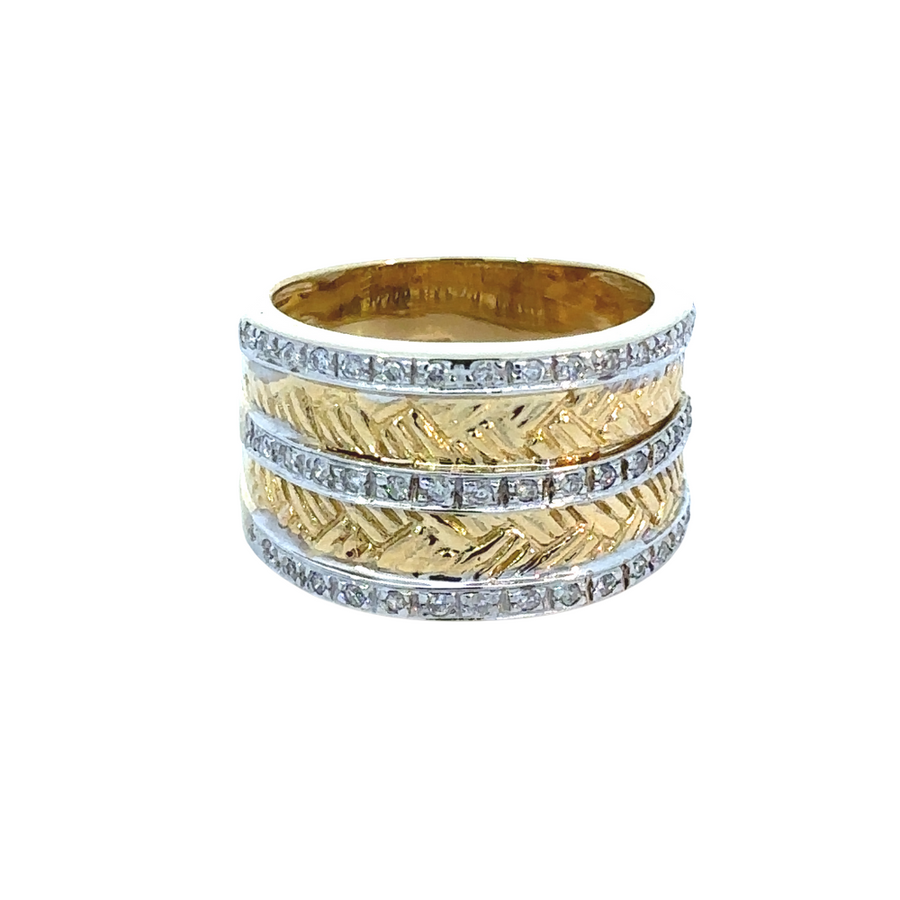 Close-up of 18k yellow and white gold ring with 0.29 CT diamonds