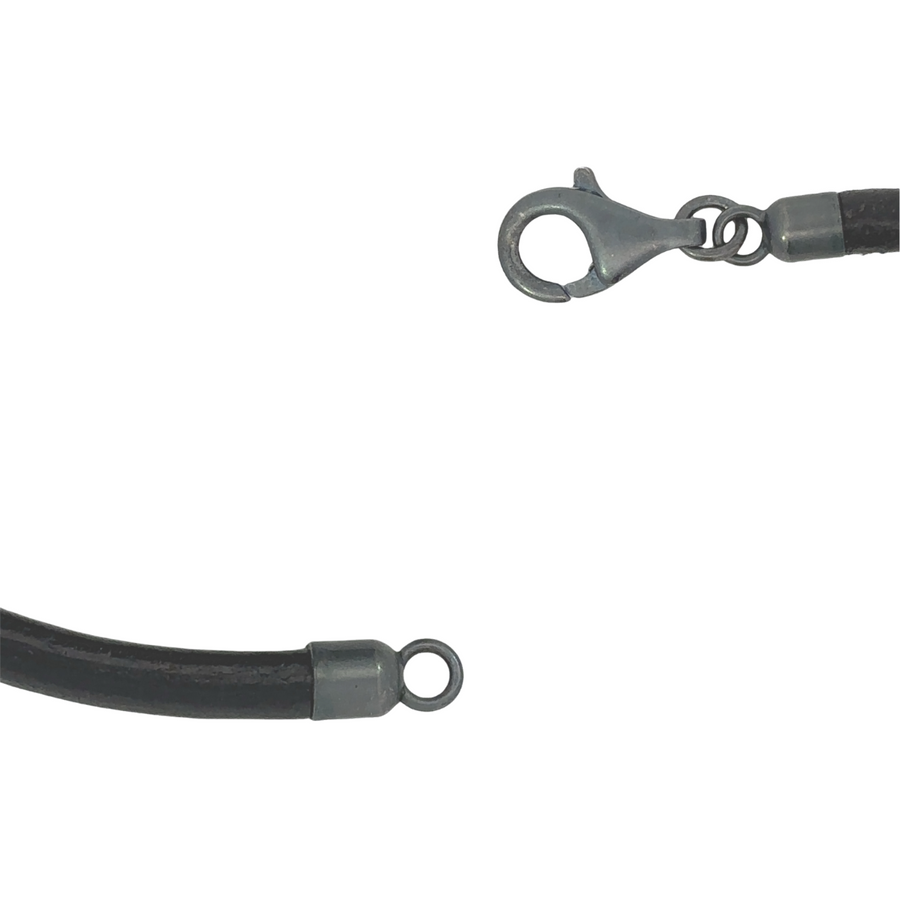 Man wearing unisex leather bracelet with peacock motif