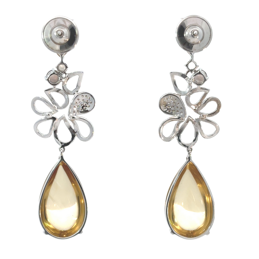 Women’s gemstone earrings in 18k white gold