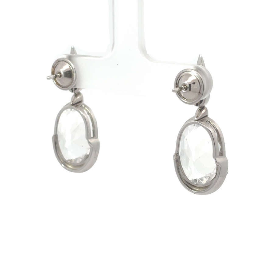 Close-up of quartz and diamond WG earrings in white gold