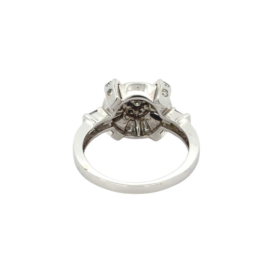 Side view of WG ring, highlighting the sleek design and the brilliance of the 0.55 CT diamond in 14k gold.

